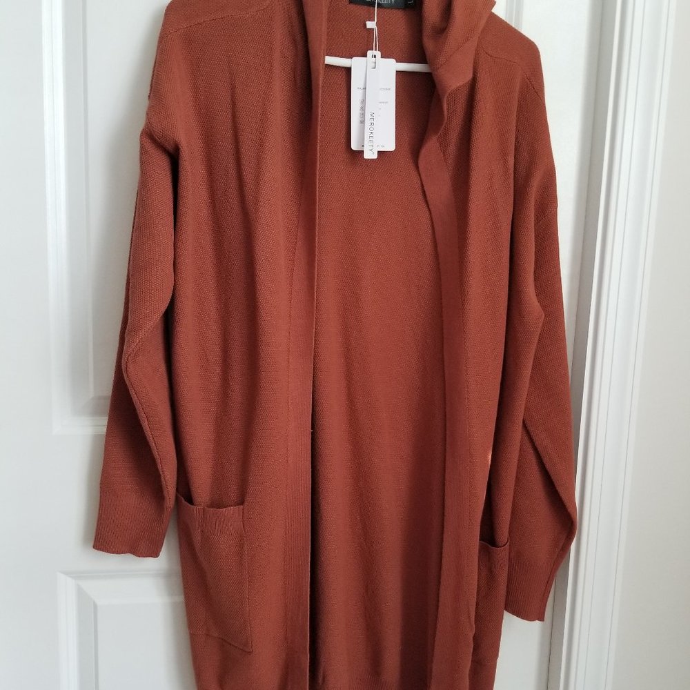 Rust colored cardigan with hood and front pockets